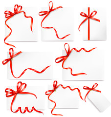 Wall Mural - Set of card notes with red gift bows with ribbons