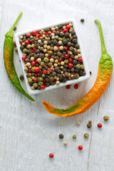 Poster - Peppercorn mix on a vintage wooden table