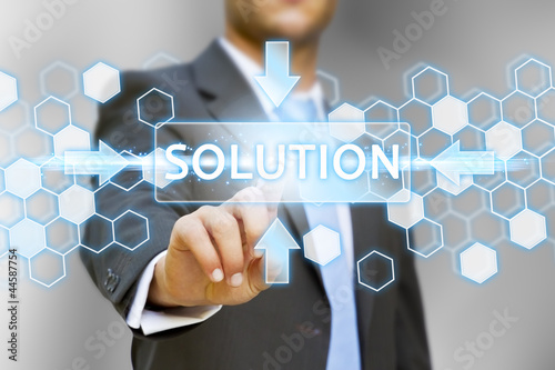 Fotografía Businessman pushing solution button concept
