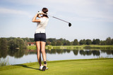 Fototapeta Desenie - Golf player teeing off