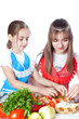 © Natalya Antoshchenko - Two girls of the cook prepare a vegetarian dish