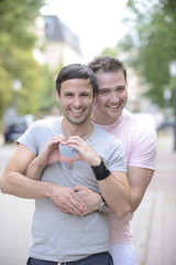 Wall Mural - Happy gay couple outdoors