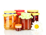 Jars with canned fruit isolated  on white