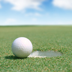 Golf ball on green