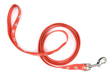 Red Nylon Dog Lead Or Leash With Paw Print Pattern On White