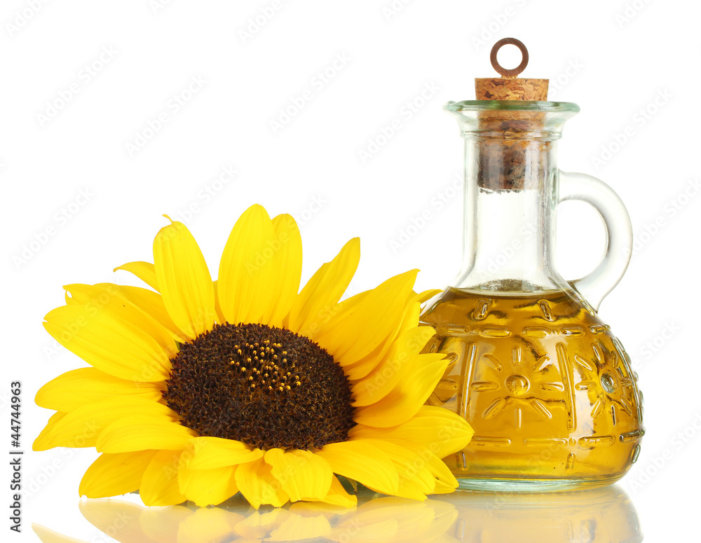 oil in bottle and sunflower, isolated on white