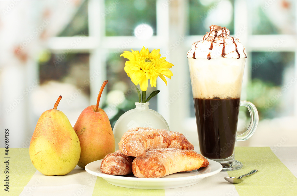 delicious bagels and fresh coffee on the table close-up