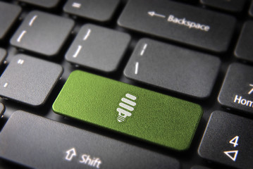 Wall Mural - green energy keyboard key, environmental background