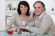 © auremar - Couple playing chess together