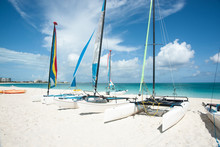 Catamarans On Caribbean Beach.