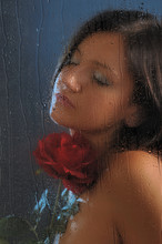 Girl In Rain With Red Rose Behind The Window