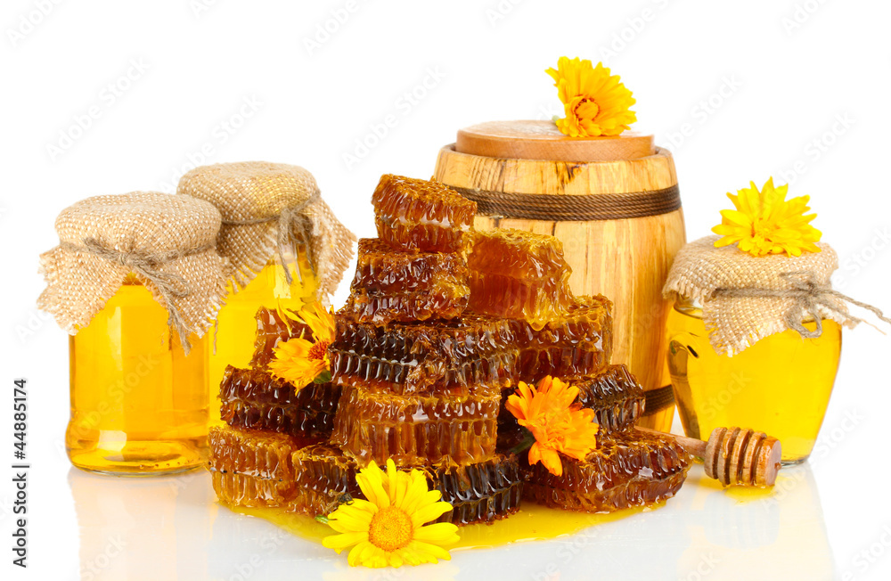 sweet honeycombs, barrel and jars with honey, isolated on white