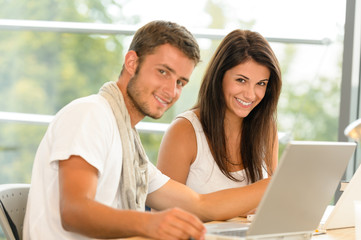 Sticker - High-school pupils using laptop for school project