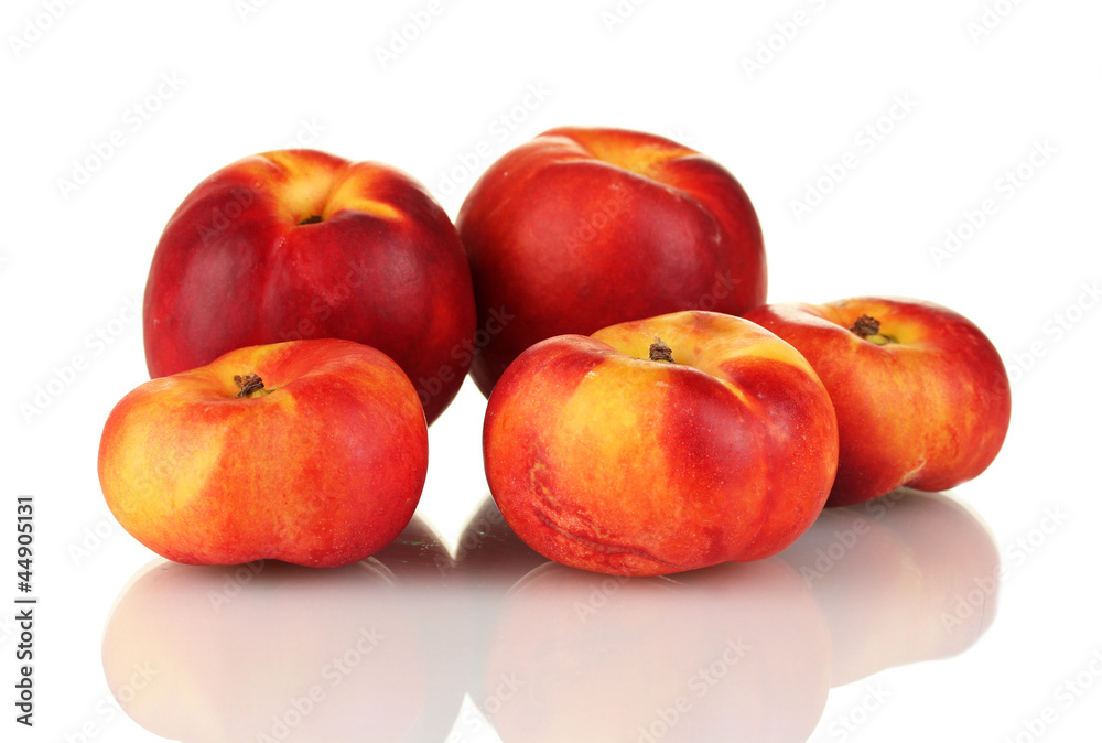 Ripe nectarines isolated on white close-up
