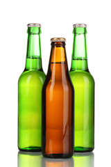 Wall Mural - three bottles of beer isolated on white
