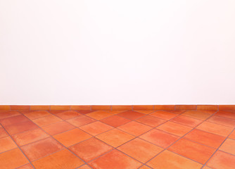 Wall Mural - Tuscan traditional old grunge floor, red tiles and white wall.