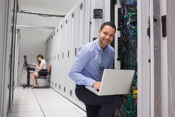 Poster - Two technicians doing data storage