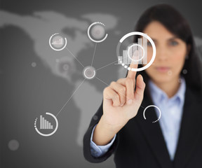 Poster - Businesswoman touching one button on black screen