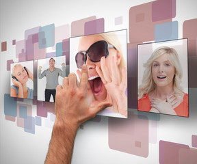 Poster - Male hand selecting photo from digital wall