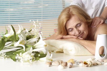 Beautiful Caucasian elderly woman at a reception