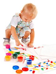 Fototapete - Child painting by finger paint.
