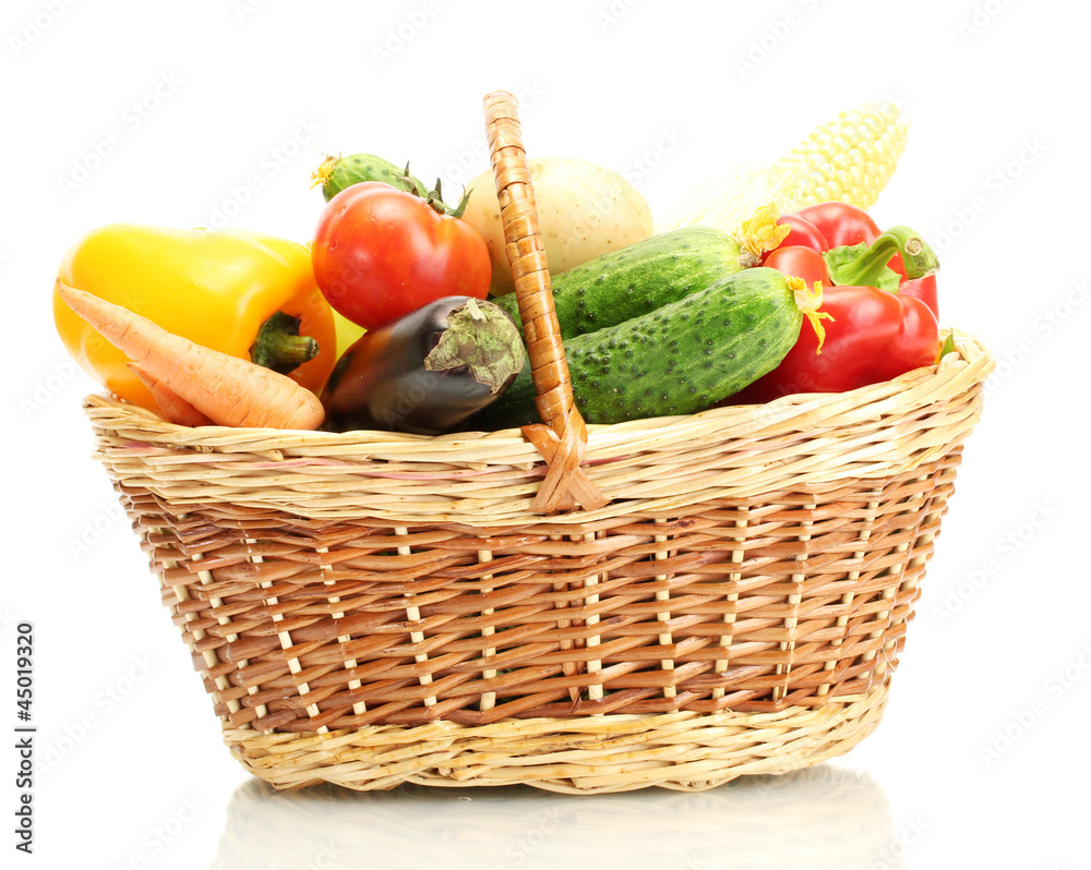 Fresh vegetables in basket isolated on white