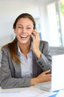© goodluz - Businesswoman on the phone laughing outloud