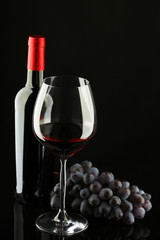 Wall Mural - bottle with red wine and glass and grapes