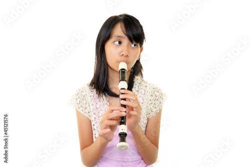 縦笛が上手く吹けず困惑した表情の女の子 Buy This Stock Photo And Explore Similar Images At Adobe Stock Adobe Stock