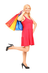 Sticker - Mature woman holding shopping bags