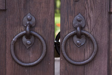 Closeup Image Of Old Door With Circle Iron Door-handle
