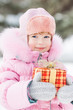 © Sunny studio - Child holding Christmas gift
