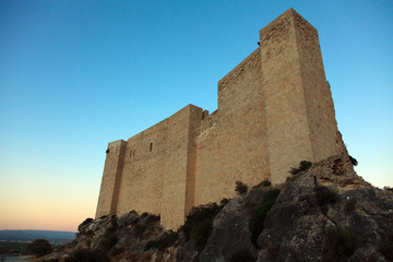 Medieval castle Miravet in Spain. Evening lighting