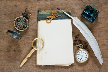 Wall Mural - Old notebook, compass, watch, quill, inkwell, magnifying glass