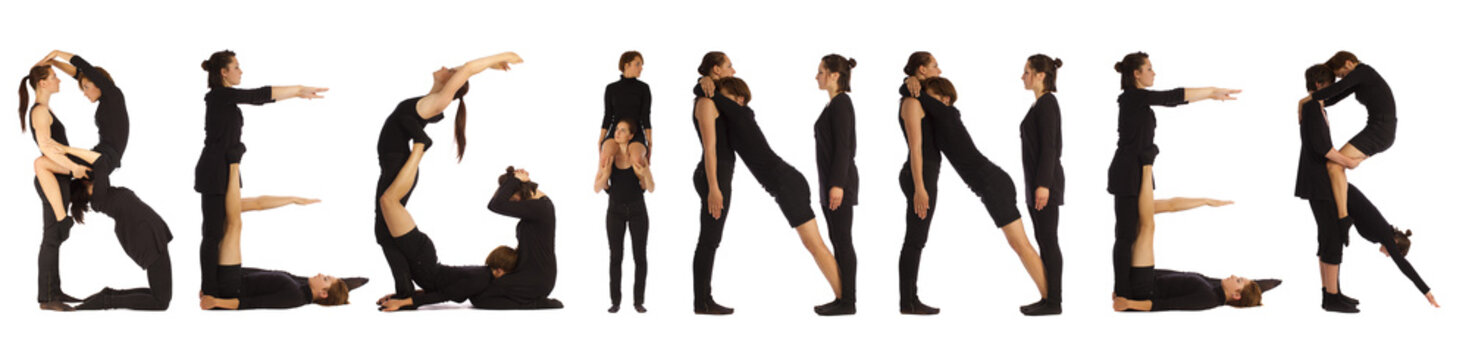 Black dressed people forming BEGINNER word over white 
