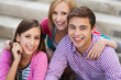 © pikselstock - Three young people smiling