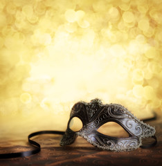 Wall Mural - carnival mask with golden background