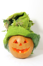 Pumpkin With Green Halloween Hat On
