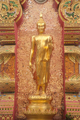 Wall Mural - Standing Buddha at Thai church .