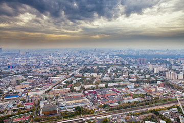 Canvas Print - panorama with dark yellow clouds under autumn Moscow