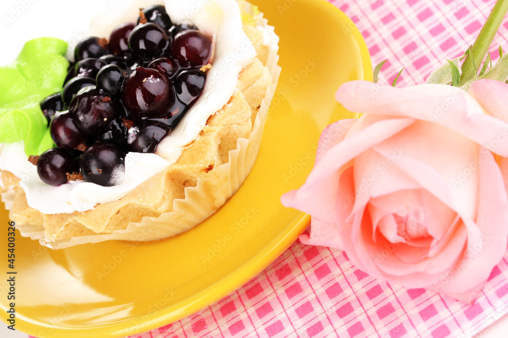 sweet cake with cup of tea close-up