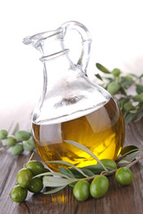 Wall Mural - carafe with olive oil