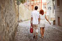 Young Couple Walking In Old Town Of Prague