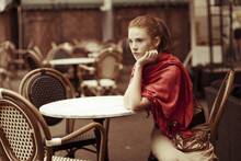 Beautiful Girl Relaxing In The Outdoor CafÃ?Â©