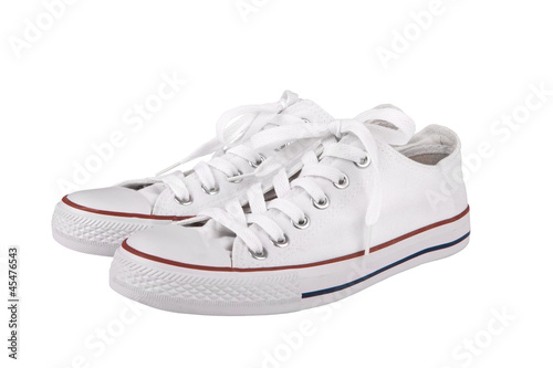 Fotografia Pair of new white sneakers on white background