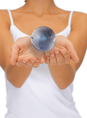 woman hands holding earth globe