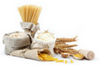 Flour, cereals, pasta in a canvas bag and ear on white backgroun
