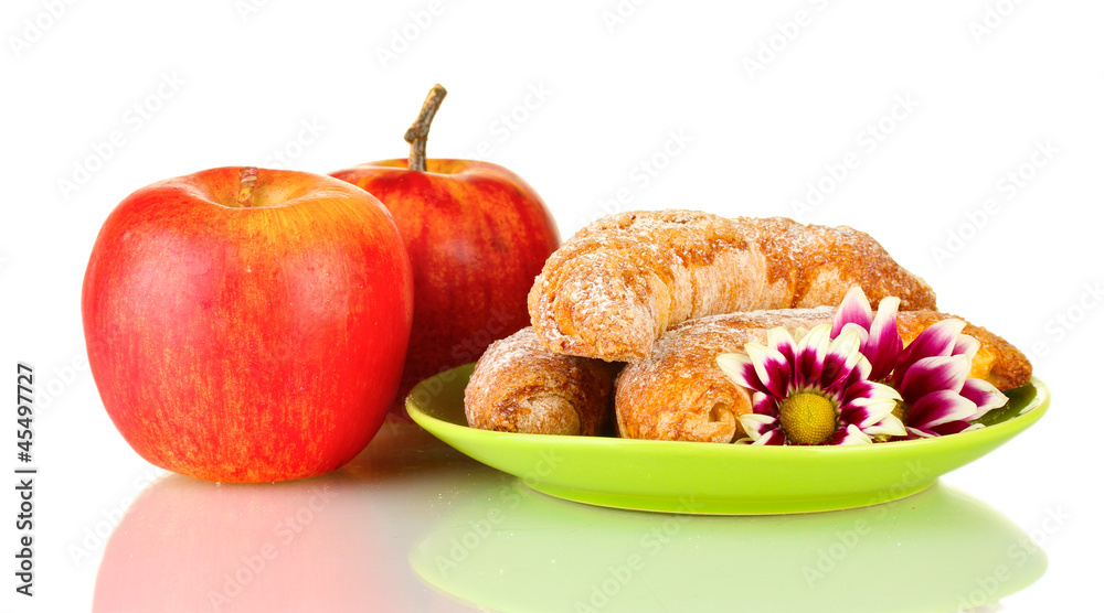 Fresh bagels with apples isolated on white