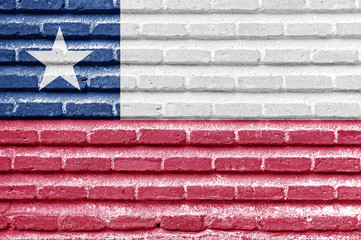 Wall Mural - Chile flag on an old brick wall