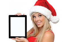 Girl In A Red Christmas Hat On New Year, Holding Tablet Touch Pa